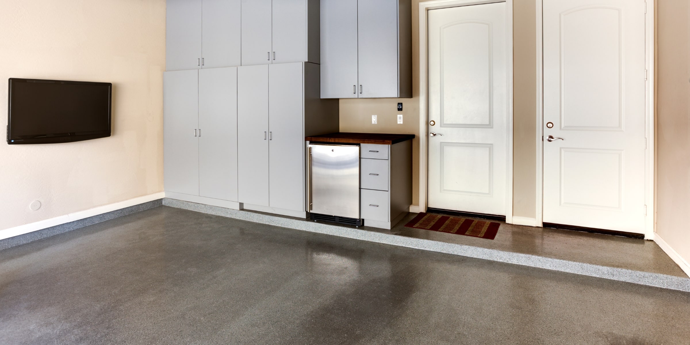 Polished concrete floor in a finished garage